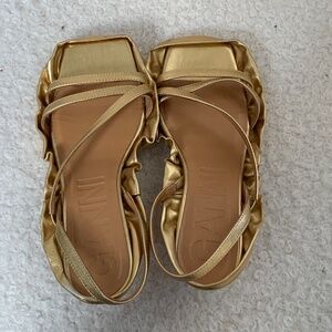 Ganni bright gold leather sandals with side fluting